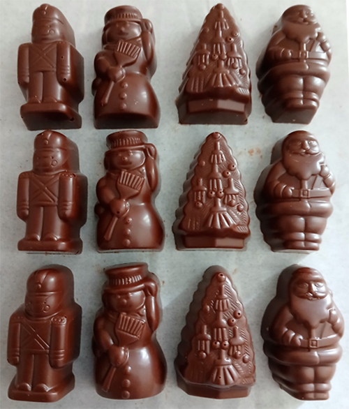 Pochette dorée +12 sujets de Noël (Père Noël, bonhomme de neige, sapin, petit soldat) en chocolat ALTERNATIVE au lait (sans lait) BIO vegan sans allergènes Exquidia : 130g